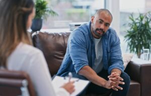person in recovery attending an addiction counseling session