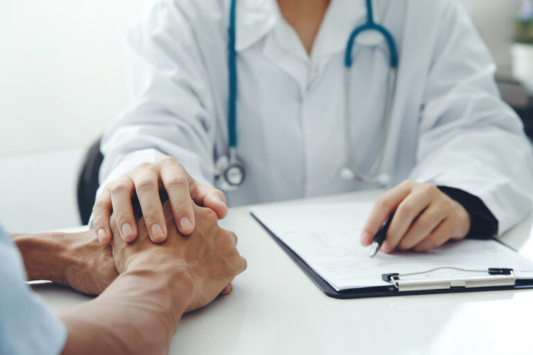 medical professional providing support to a person receiving Naltrexone treatment