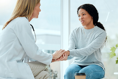 woman getting support from a medical professional